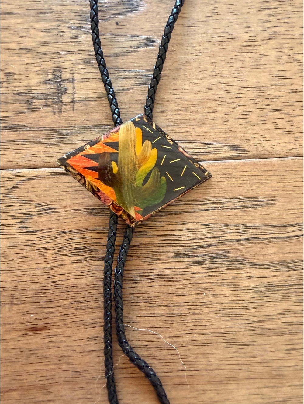 Western Style Black Leather Bolo Tie with Decorative Slide